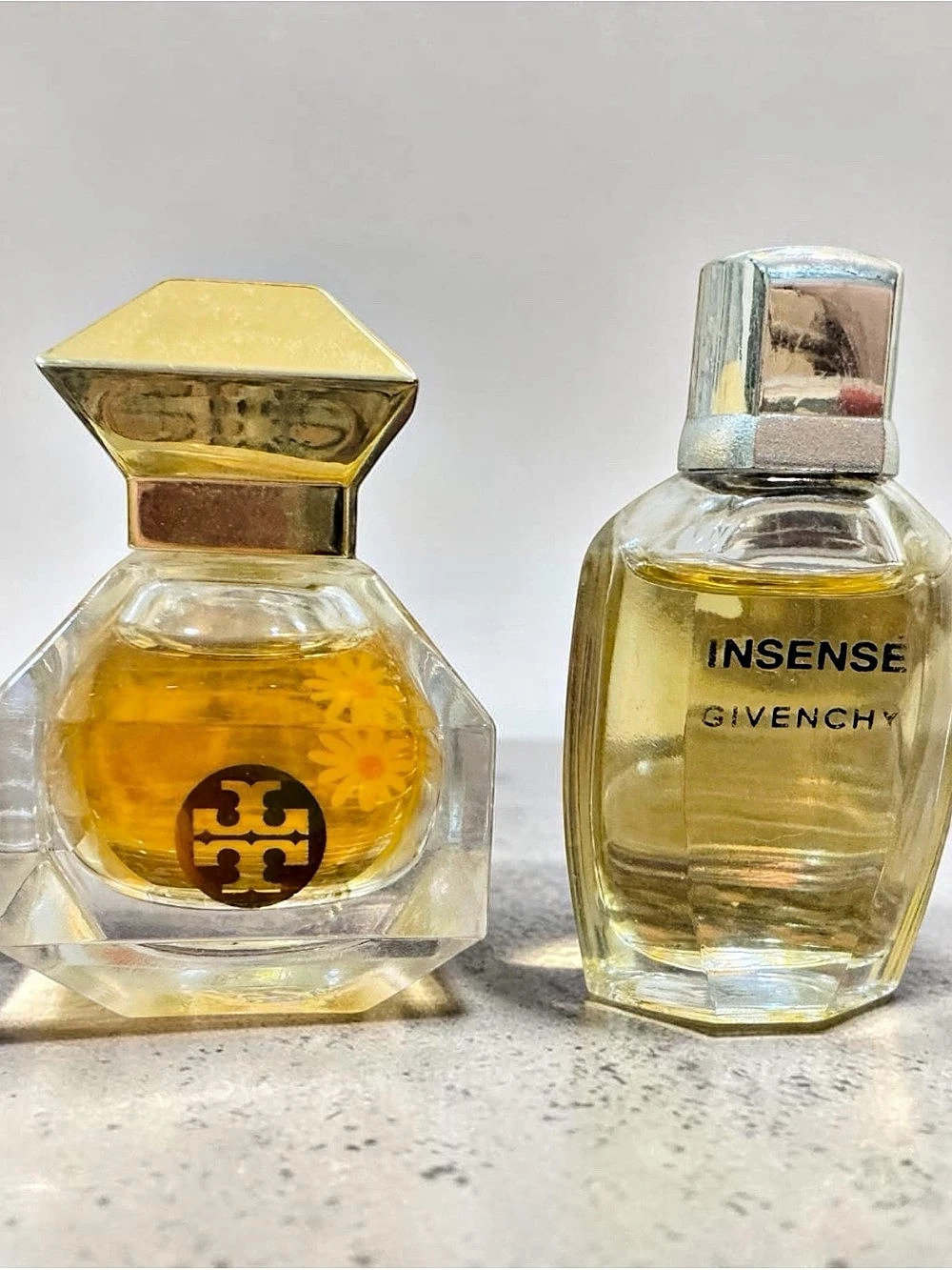 Givenchy Insense Fragrance &
Tory Burch pu re Parfume